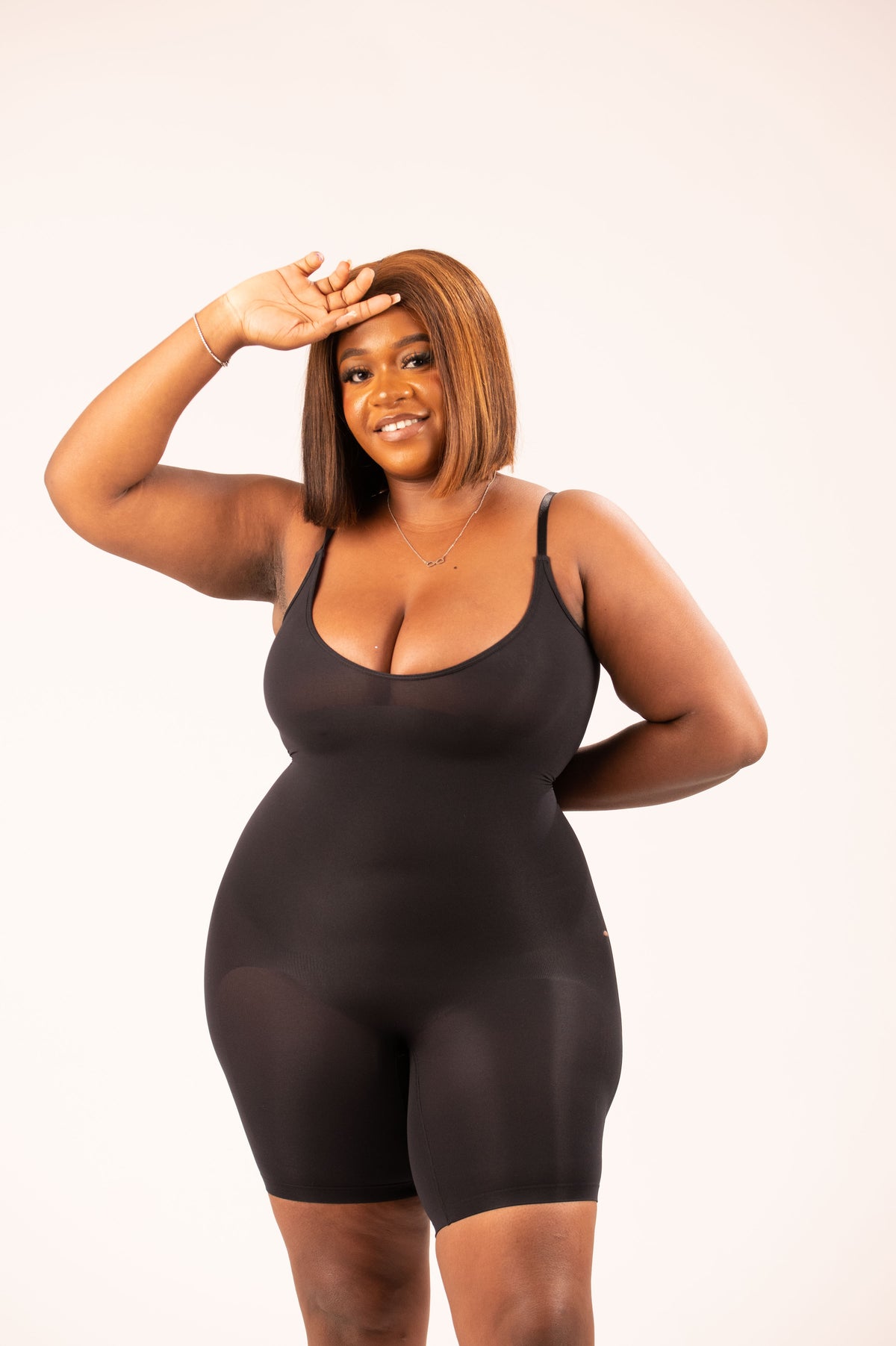 Model wearing Getfit Glove Shorts in black, showcasing comfort and style for shapewear.